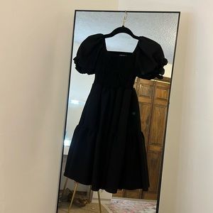 Smocked black dress from local boutique.